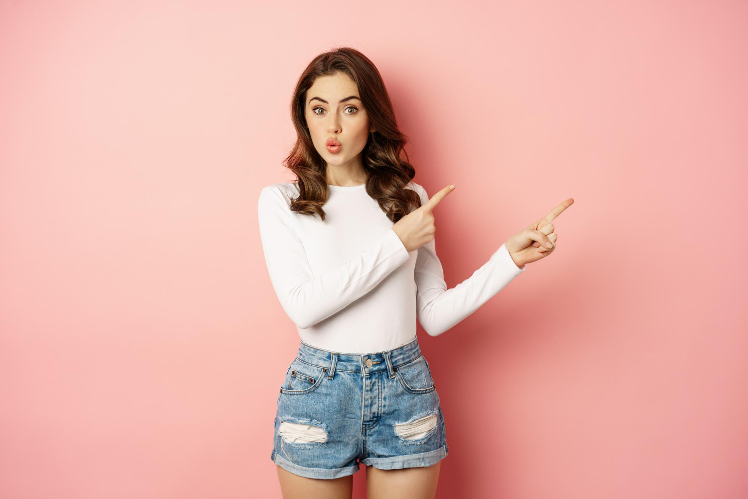 portrait-intrigued-stylish-girl-showing-interest-advertisement-look-curious-pointing-upper-right-corner-logo-banner-discount-news-pink-background